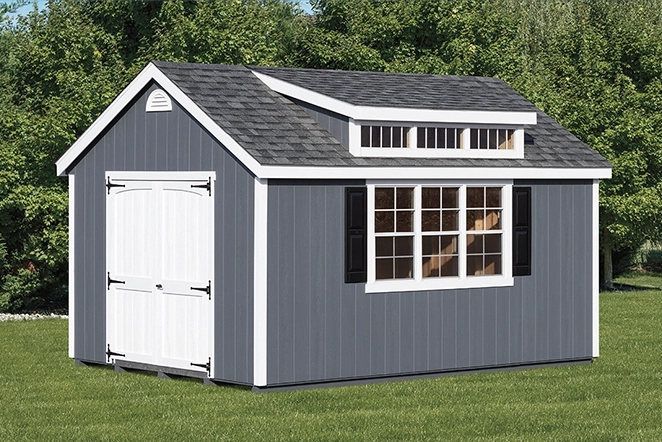 new england shed design with transom window and white trim