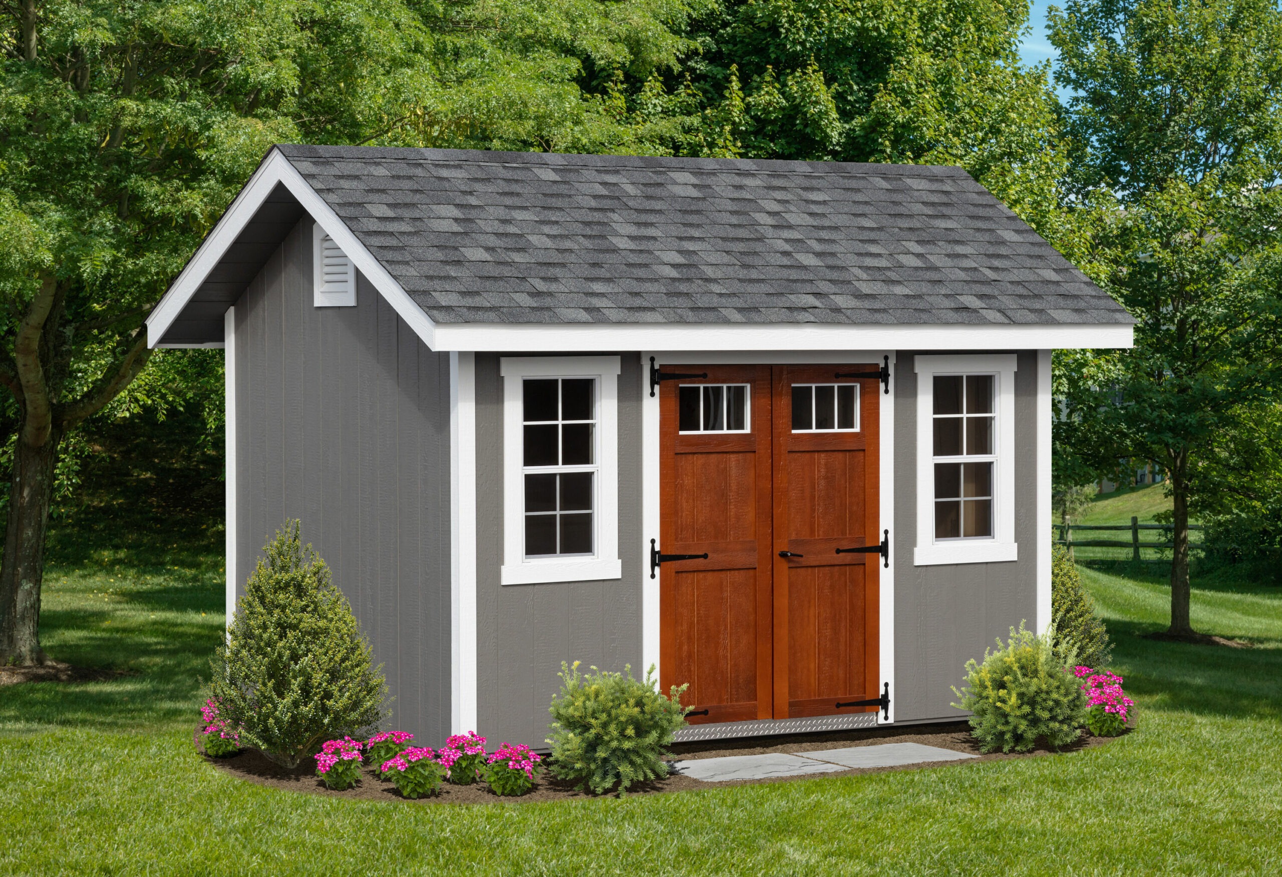 gray shed with white trim and no shutters