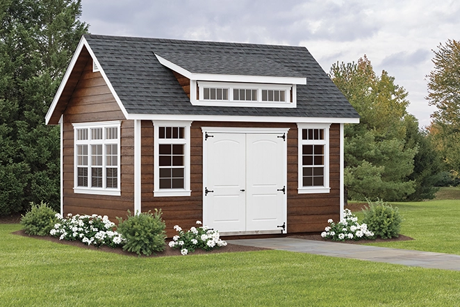 manor backyard shed with double doors and many windows