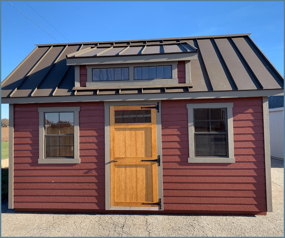 manor backyard shed with custom paint, metal roof, transom