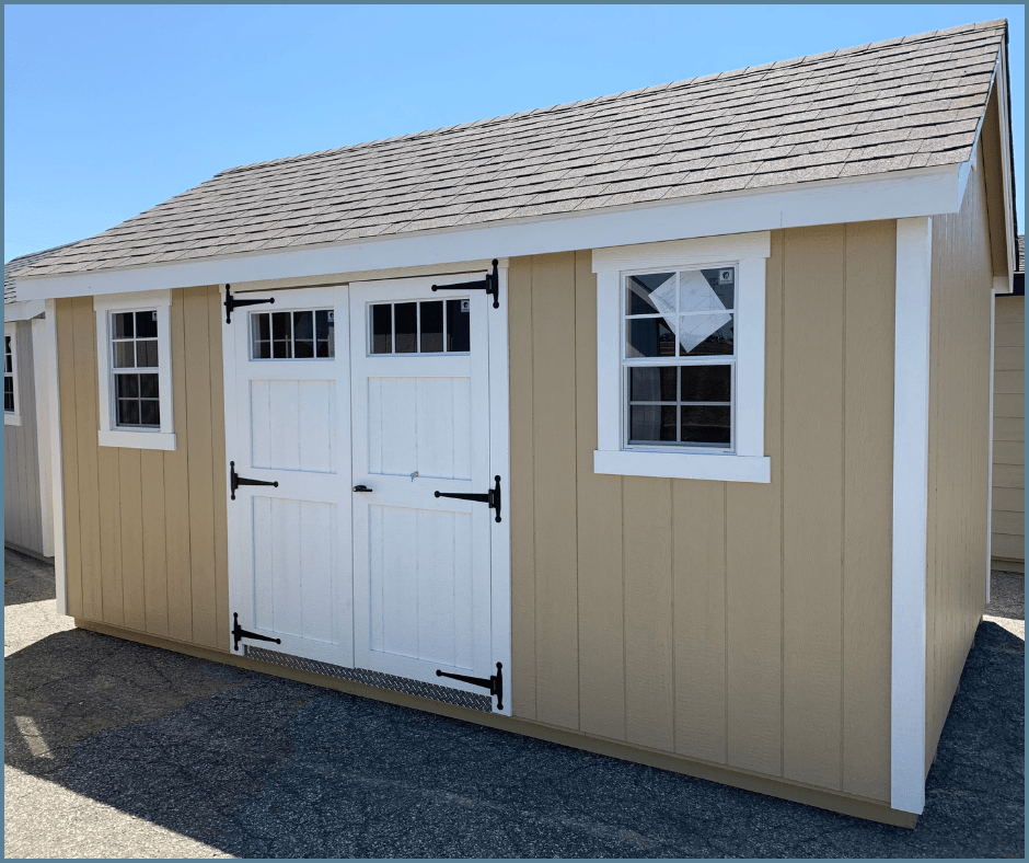 autumn tan shed with asphalt shingle roof 10x16